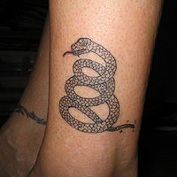 Judy's rattlesnake tattoo